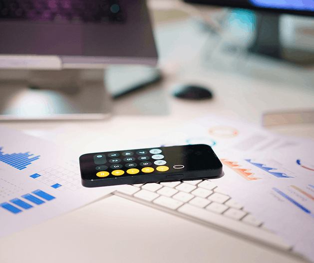 Smartphone and business documents on desk